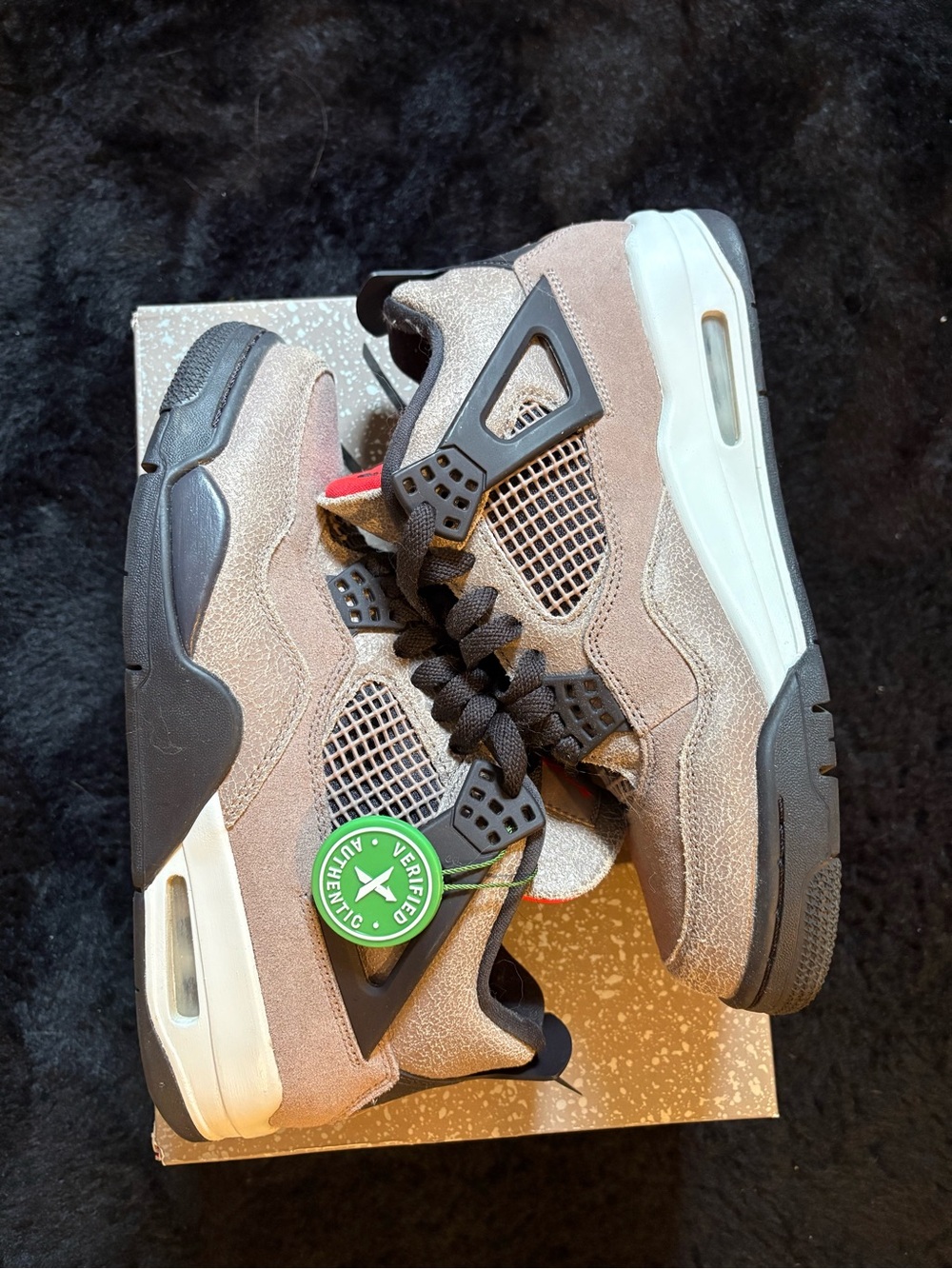 Jordan Taupe and Black Retro 4 Sneakers